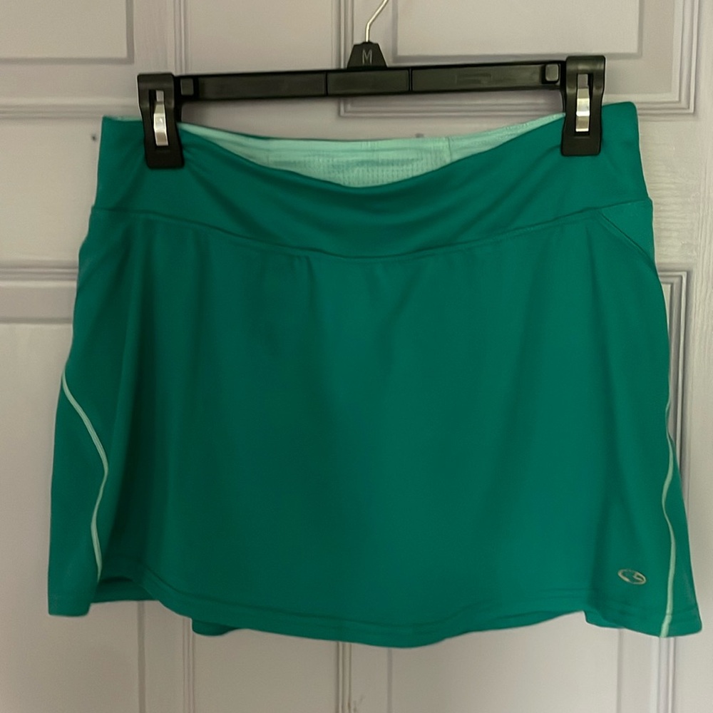 Teal skort, with inner back key pocket